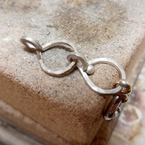 Judy Larson's A New Take on a Figure-8 Chain - , Contemporary Wire Jewelry, Cutting, Cutting Tool, Cutters, Loops, Wire Loop, Wrapped Wire Loop, Design, slide a piece of balled wire into the paste solder.